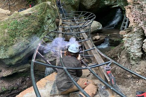 Andy welding the compound curve for Hayes Creek Run trail