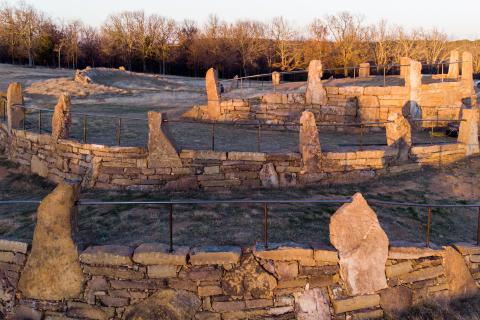 Steel railings spanning rock 